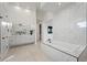 Modern bathroom with a large soaking tub and double vanity at 9780 Solar Ave, Las Vegas, NV 89149