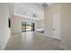 Bright bedroom with sliding doors opening to a pool view at 9780 Solar Ave, Las Vegas, NV 89149