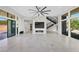 Modern living room, marble fireplace, and large windows at 9780 Solar Ave, Las Vegas, NV 89149