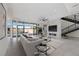 Bright living room with sliding doors to backyard and pool at 9780 Solar Ave, Las Vegas, NV 89149