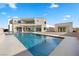 Modern home showcasing a large pool and backyard at 9780 Solar Ave, Las Vegas, NV 89149