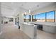 Modern wet bar with wine coolers and backyard view at 9780 Solar Ave, Las Vegas, NV 89149