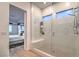 Spacious walk-in shower with glass enclosure and built-in seat at , Las Vegas, NV 89138