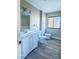 Modern bathroom with updated vanity, toilet, bidet, and flooring at 1032 Morning Sun Way, Las Vegas, NV 89110