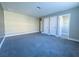 Large bedroom with gray walls and carpet flooring at 1032 Morning Sun Way, Las Vegas, NV 89110