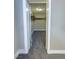 Walk-in closet with double hanging rods and grey carpet at 1032 Morning Sun Way, Las Vegas, NV 89110