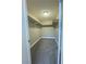 Bright walk-in closet featuring neutral walls and carpeting at 1032 Morning Sun Way, Las Vegas, NV 89110
