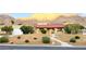 One-story home with red tile roof, desert landscaping, and mountain views at 1032 Morning Sun Way, Las Vegas, NV 89110