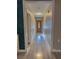 Bright hallway with light wood laminate flooring at 1032 Morning Sun Way, Las Vegas, NV 89110
