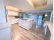 Spacious kitchen with white cabinets, island, and stainless steel appliances at 1032 Morning Sun Way, Las Vegas, NV 89110