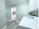 Laundry room with washer, dryer, and access to kitchen at 1032 Morning Sun Way, Las Vegas, NV 89110