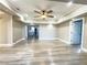 Bright living room with hardwood floors and ceiling fan at 1032 Morning Sun Way, Las Vegas, NV 89110