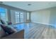 Relaxing living room with hardwood floors and French doors at 1032 Morning Sun Way, Las Vegas, NV 89110