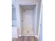Clean and spacious shower with bright white tile and pebble floor at 1032 Morning Sun Way, Las Vegas, NV 89110