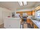 Well-equipped kitchen with stainless steel appliances and wood cabinetry at 1043 Oak Shade Ln, Henderson, NV 89015