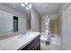 Bathroom with single sink, granite countertop and a bathtub at 10598 Aphrodite St, Las Vegas, NV 89183