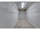 Large walk-in closet with wire shelving and carpeted flooring at 10598 Aphrodite St, Las Vegas, NV 89183