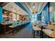 Modern bar with light blue walls and comfortable seating at 135 E Harmon Ave # 2302, Las Vegas, NV 89109