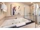 Relax in this bathroom's luxurious jetted tub and separate shower at 135 E Harmon Ave # 2302, Las Vegas, NV 89109