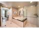 Spa-like bathroom featuring a large soaking tub and a walk-in shower at 135 E Harmon Ave # 2302, Las Vegas, NV 89109