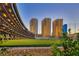Driving range with modern building and city view at 135 E Harmon Ave # 2302, Las Vegas, NV 89109