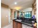 Kitchen features a dishwasher and a view to the living room at 135 E Harmon Ave # 2302, Las Vegas, NV 89109