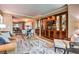Open concept living room with a partial view of the kitchen and dining area at 135 E Harmon Ave # 2302, Las Vegas, NV 89109
