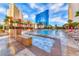 Resort-style pool with spa and lounge chairs at 135 E Harmon Ave # 2302, Las Vegas, NV 89109