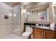 Spa-like bathroom with glass shower and updated vanity at 145 E Harmon Ave # 1920, Las Vegas, NV 89109