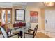 Small dining area with glass table and four chairs, near entryway at 145 E Harmon Ave # 1920, Las Vegas, NV 89109