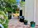 Stone patio walkway with built-in grill and landscaping at 1915 Hazeltine Ct, Henderson, NV 89074