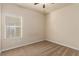 Simple bedroom with window and ceiling fan at 2149 Morro Vista Dr, Las Vegas, NV 89135