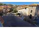 Community view showing building exteriors and street at 30 Strada Di Villaggio # 151, Henderson, NV 89011