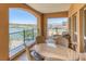 Spacious balcony with lake and mountain views, perfect for outdoor dining at 30 Strada Di Villaggio # 151, Henderson, NV 89011