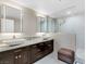 Modern bathroom with double sinks and walk-in shower at 30 Strada Di Villaggio # 151, Henderson, NV 89011