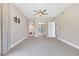 Primary bedroom with ample space and mirrored closet at 30 Strada Di Villaggio # 151, Henderson, NV 89011