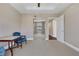 Bright bedroom with mirrored closet doors and access to another room at 30 Strada Di Villaggio # 151, Henderson, NV 89011