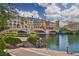 Picturesque bridge over a lake with building and mountain views at 30 Strada Di Villaggio # 151, Henderson, NV 89011