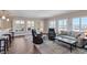Bright living room with lake view and fireplace at 30 Strada Di Villaggio # 151, Henderson, NV 89011