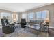 Bright living room with lake views and comfy seating at 30 Strada Di Villaggio # 151, Henderson, NV 89011