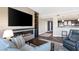 Living area with fireplace and built-in entertainment center at 30 Strada Di Villaggio # 151, Henderson, NV 89011
