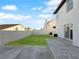 Spacious backyard with grassy lawn and concrete patio at 3350 Stacey Lyn Dr, Las Vegas, NV 89117