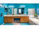Double vanity bathroom with teal walls and a soaking tub at 3350 Stacey Lyn Dr, Las Vegas, NV 89117