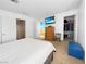 Bright bedroom with a large bed, dresser and walk-in closet at 3350 Stacey Lyn Dr, Las Vegas, NV 89117