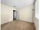 Simple bedroom with carpet and access to a full bathroom at 3350 Stacey Lyn Dr, Las Vegas, NV 89117