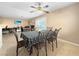 Bright dining room features a table with six chairs, ceiling fan and access to the Gathering room at 3350 Stacey Lyn Dr, Las Vegas, NV 89117