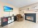 Gathering room with fireplace, built-in shelving and comfortable seating at 3350 Stacey Lyn Dr, Las Vegas, NV 89117
