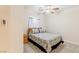 Simple bedroom with ceiling fan and window at 3409 Cantura Bluff Ave, North Las Vegas, NV 89031