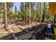 Landscaped backyard with stone retaining walls at 362 Rainbow Canyon Blvd, Las Vegas, NV 89124