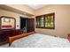 Subtle bedroom with hardwood floors and a wood bed frame at 362 Rainbow Canyon Blvd, Las Vegas, NV 89124